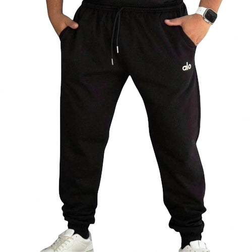 DUALLITY WEAR black soft fabric jogger pants with drawstring and alo logo, relaxed fit for gym or casual wear.