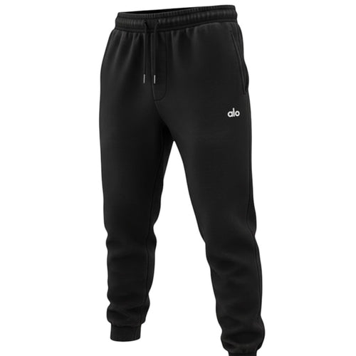DUALLITY WEAR black jogger pants with drawstring waist and subtle alo logo. Soft fabric, relaxed fit.