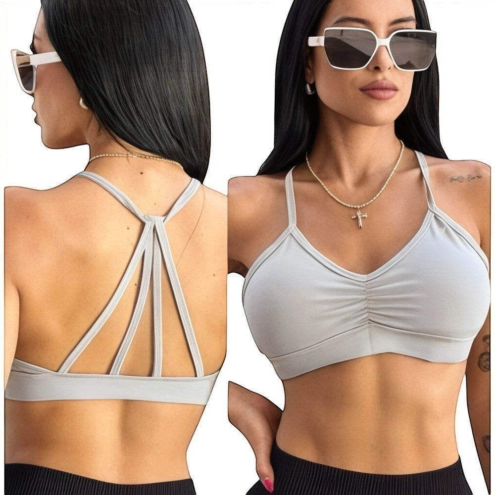 DUALLITY WEAR light grey ruched sports bra with strappy back detail, made from light stretch fabric for gym or daily wear.